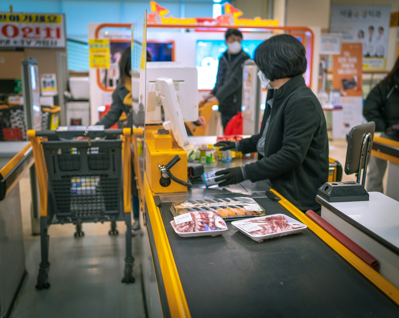 Store employee working at a cash register