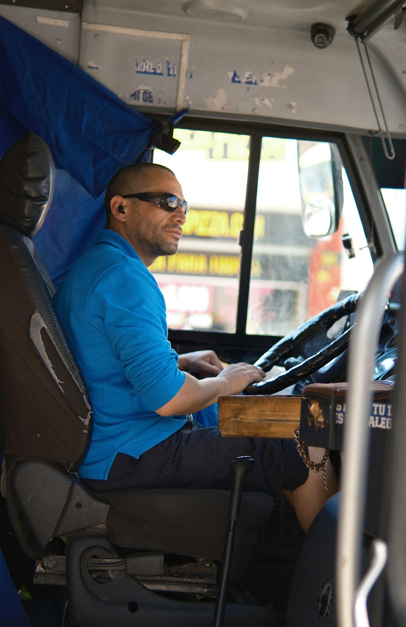 Bus driver in the driver's seat